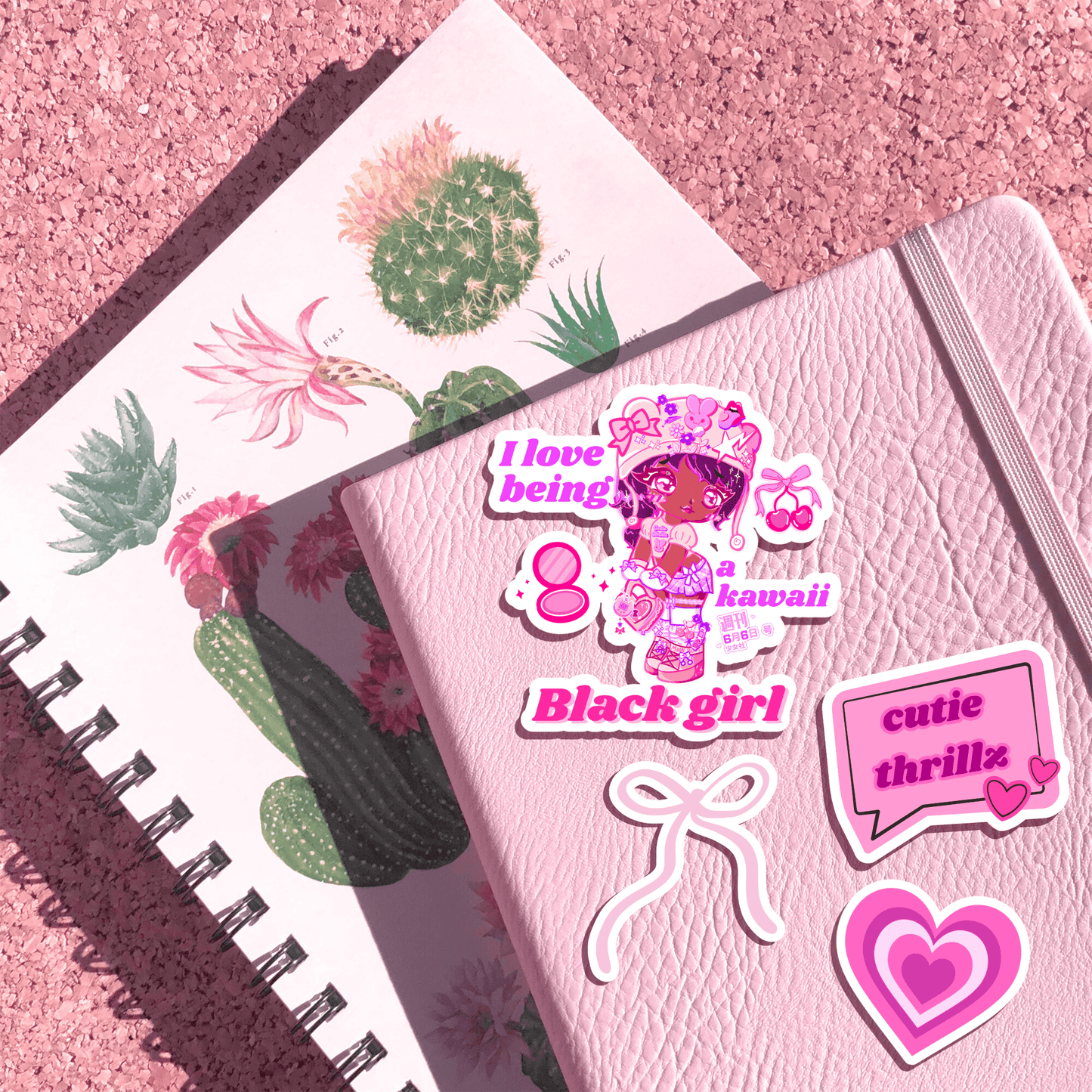 Kawaii Black Girl Sticker - Waterproof Vinyl Decor on a pink journal with other cute decals, great for journaling and aesthetic sticker lovers.