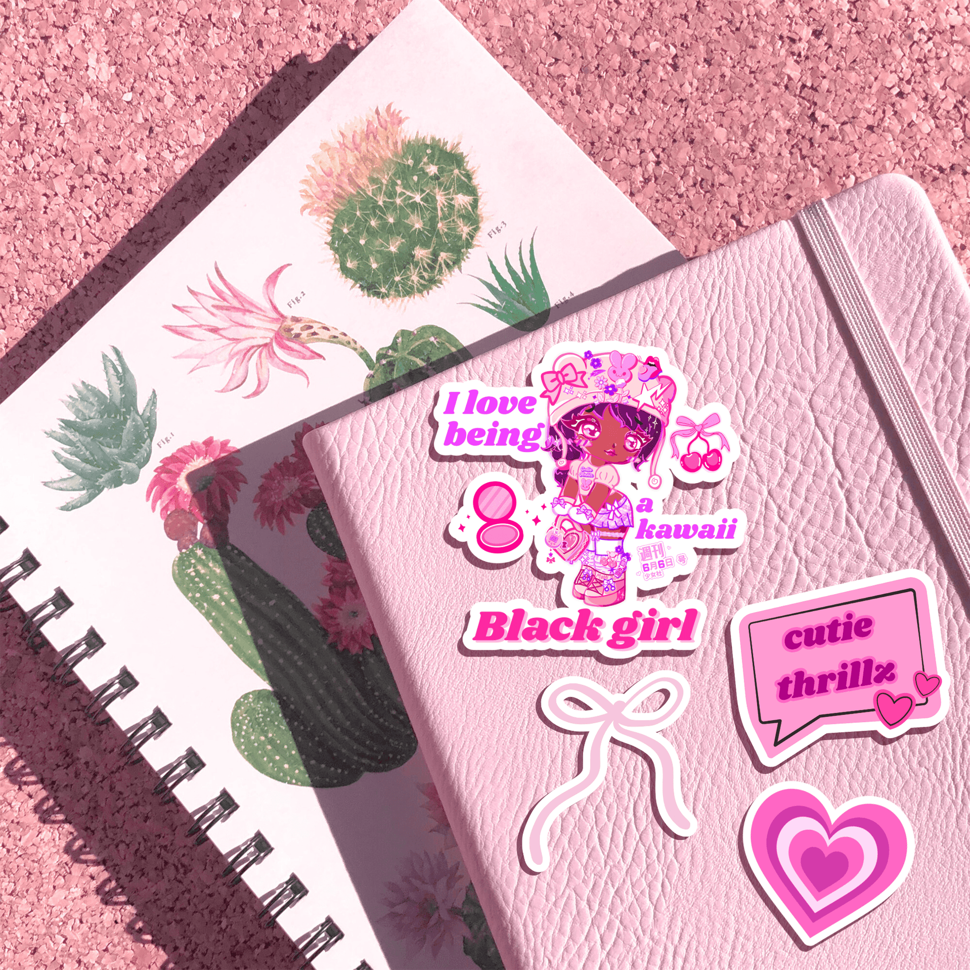 Kawaii Black Girl Sticker - Waterproof Vinyl Decor on a pink journal with other cute decals, great for journaling and aesthetic sticker lovers.