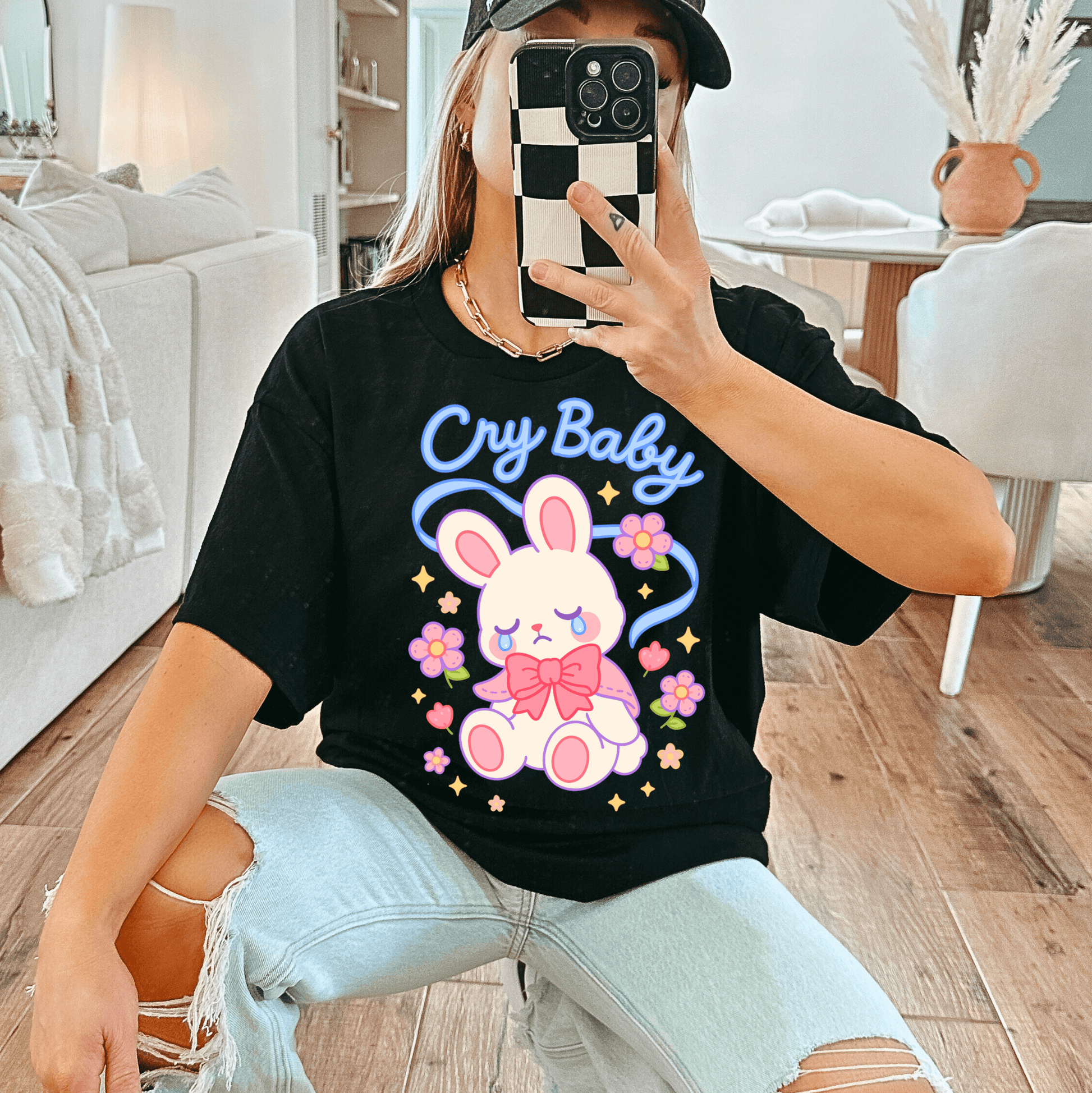 Kawaii Coquette T-shirt in black featuring a crying bunny graphic with 'Cry Baby' text, styled for soft girl and aesthetic streetwear fashion.