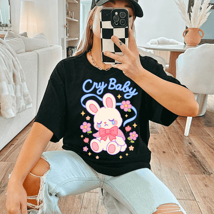 Kawaii Coquette T-shirt in black featuring a crying bunny graphic with 'Cry Baby' text, styled for soft girl and aesthetic streetwear fashion.