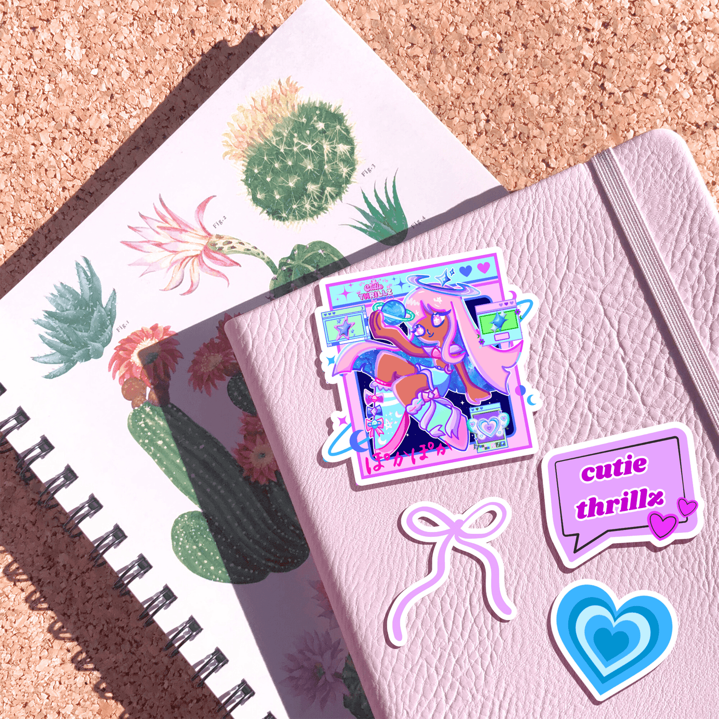Kawaii Vinyl Sticker - Star Girl Aesthetic on pink journal with additional cute stickers, ideal for planner decor and journaling.